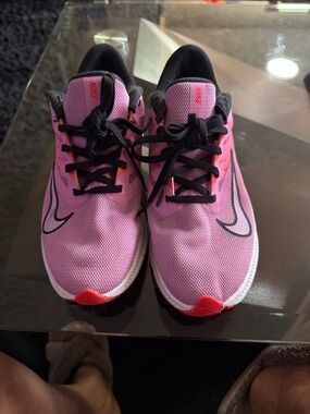Nike Pink and Black Ladies' Running Sneakers with Coral Accents